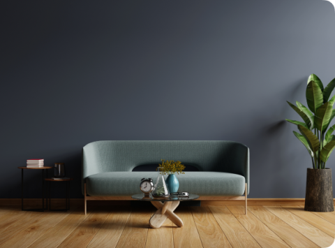 Mint-green sofa in a dark blue living room